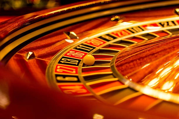 Live-dealer blackjack table with dealer and cards visible
